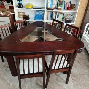 Triangular dining table with 6 chairs