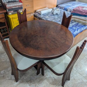 Circular dining table with 4 chairs