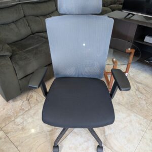 Black adjustable chair with headrest