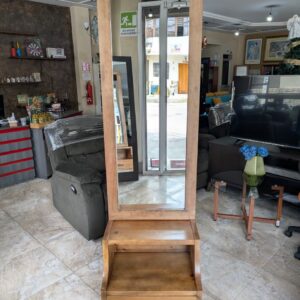 Full-length mirror with a drawer.
