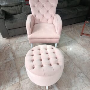 Pink velvet armchair with footrest